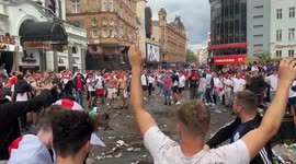 England fans brought chaos to Leicester Square as trees thrown into air