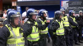 Riot police clear England fans from Leicester Square in London as England prepare to face Italy in Euro 2020 Final