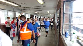 England fans arrive at Wembley Park tube station ahead of the final of Euro 2020 between Italy and England.