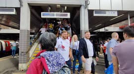 England fans arrive at Wembley Park tube station ahead of the final of Euro 2020 between Italy and England.