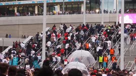 Football fans make mad dash into Wembley Stadium thinking they can watch the match