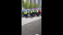 Moment football fans breach security barriers outside Wembley stadium ahead of Euro 2020 final