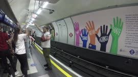 England Fans Try To Stay Postive By Partying On the London Underground