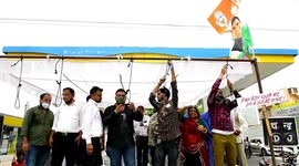 Congress activists nooses around their neck during protest against Modi Government in India