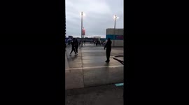 Wembley fans who crashed the gates being moved on by the police