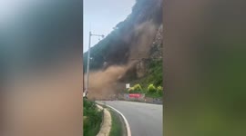 Mud and rocks crash down mountain and block road in northern China