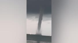 Giant waterspout forms near ferry terminal in Singapore