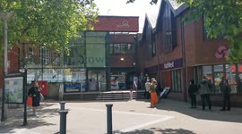 People queue at the Waltham Forest GP-LED Covid vaccination, London, UK