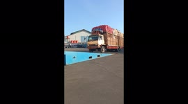 Can you spot the illusion? Truck appears to drive into swimming pool in Indonesia