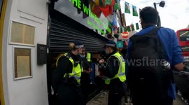Aftermath of a London bar after England fans attempt to break in.