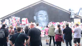 People leave hundreds of supportive notes on the giant Marcus  Rashford mural Manchester, England, now fully repaired by street artist Akse.