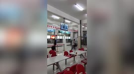 Water leak erupts through floor at university canteen in China
