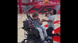 'Kind-Hearted Man Helps Young Boy Spin Basketball on his Finger'