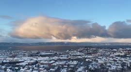 Winter Snow Clouds Hover Over the Ocean During Windy Day In Trondheim Norway
