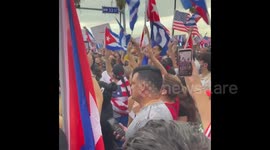 'SOS Cuba' Solidarity protestors support Cuba outside the United States Southern Command in Florida