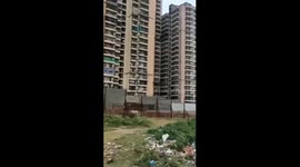 Woman Hanging From Balcony Holding Man Hands Falls,Miraculously Survives