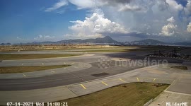 Two dust devil tornadoes form near Hong Kong Airport