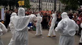 White masks takes part in protest against mandatory vaccination and health pass in Nantes ,France