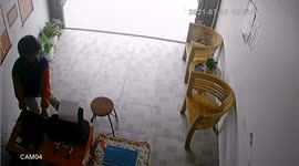 CCTV captures the moment a duo steals a few gadgets at a postal delivery office in Indonesia