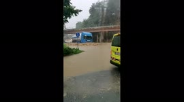 Truck driving through flooded area in Germany | truck almost sinks in water