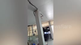 Terrifying moment ceiling collapses after rain storm in Thailand