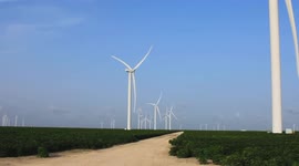 Saharan Dust as seen over a cotton field with wind turbines near the community of Chapman Ranch, Texas during an evening