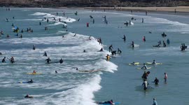Hundreds of surfers in Cornwall enjoy UK heatwave ahead of 'freedom day'
