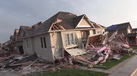Barrie, Canada, cleans up after a tornado destroys dozens of homes