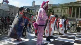 ‘Alice in Wonderland’-themed chess game is played in London's Trafalgar Square with real moving pieces