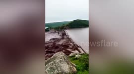 Moment dam buckles and bursts due to heavy rainfall in north China