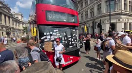 'Freedom Day': Anti-mask protesters cover London bus with stickers