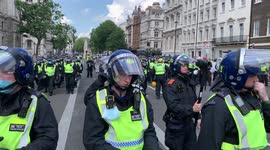 15. Man arrested for holding up a mirror to police at London anti-lockdown rally