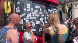 6a. Woman gets angry at a London anti-lockdown protest in Parliament Square next to a blocked TFL bus.