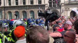 3. Police scuffle with protestors at London anti-lockdown rally