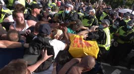 Anti-lockdown protester batters police officers with umbrella during London 'Freedom Day' rally