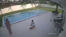 Four-year-old boy falls into pool while riding scooter