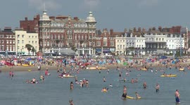Weymouth Beach packed as heatwave continues to scorch UK