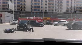Car hit a motorcyclist, scooter is broken, motorcyclist minor injuries