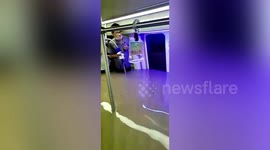 Watch moment Chinese subway commuters get trapped neck-deep in floodwater