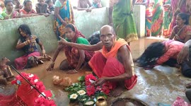 Women make peculiar body movement to please rain god in Eastern India