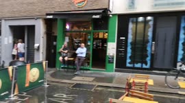 During The July Heatwave In London Rain Pours In London
