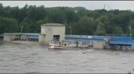 Dramatic moment boat sinks in German floods after slamming into bridge