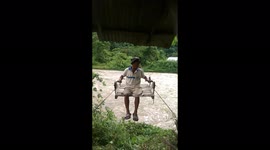 Take a look at the innovative way this Indian farmer transports himself across a river