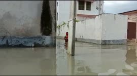 Locals in flood-hit eastern India use cooking pots to form makeshift rafts