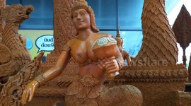 Huge wax floats made for Buddhist candle festival in Thailand