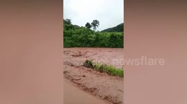 Flash floods hit Laos destroying farming fields
