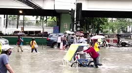 Motorists stranded as typhoon In-fa and Cempaka cause floods in the Philippines