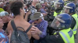 UK POLICE PUSH DISABLED FILM MAKER WHILST HE IS SITTING DOWN