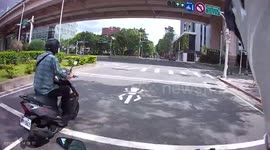 CLOSE CALL: Moped rider cuts off another rider almost causing a rear-end crash