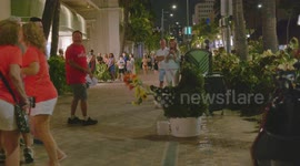 Prankster dressed as a plant scares unsuspecting passersby in Hawaii